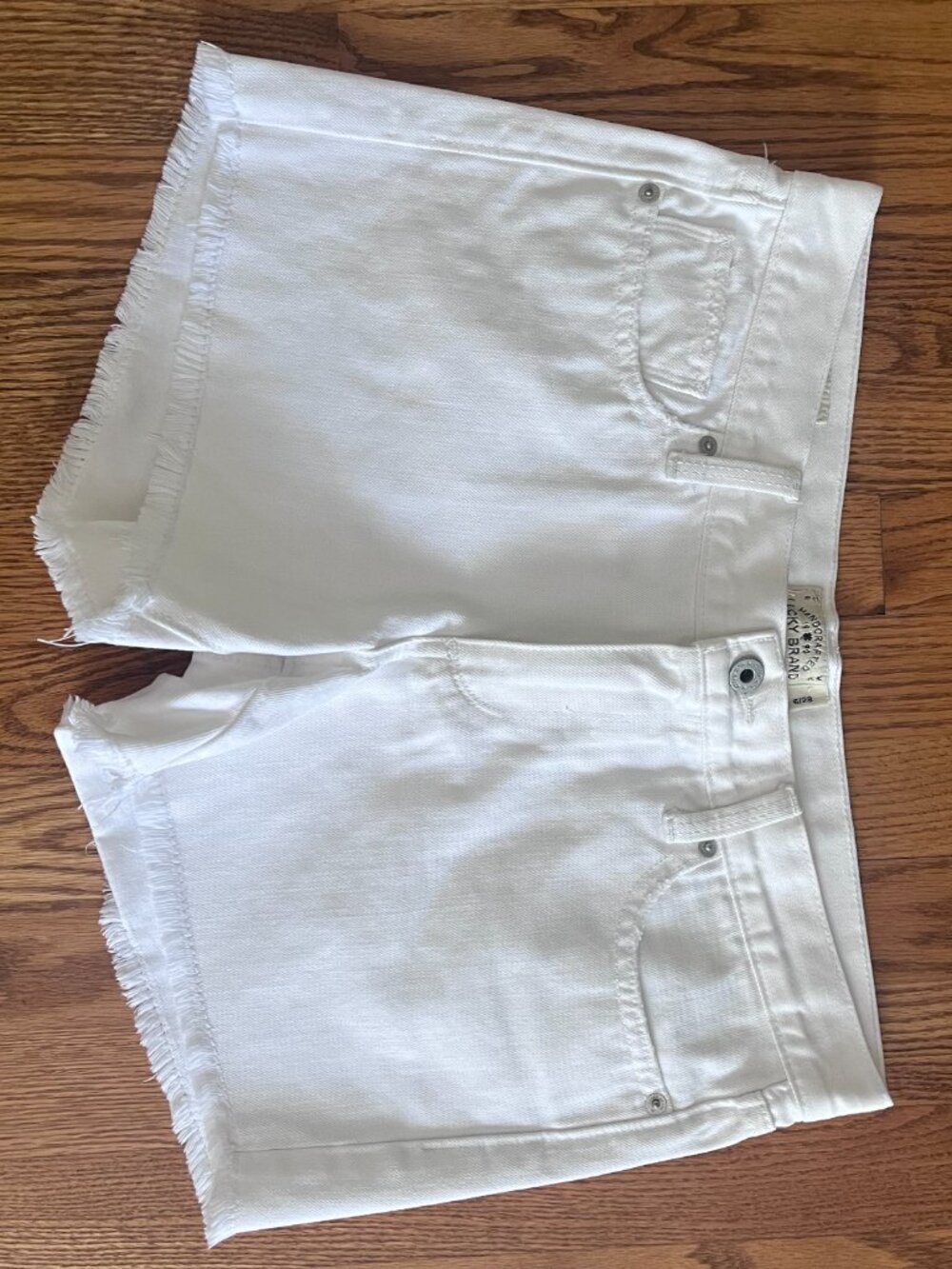 Lucky Brand white denim cut off shorts, Size 8.